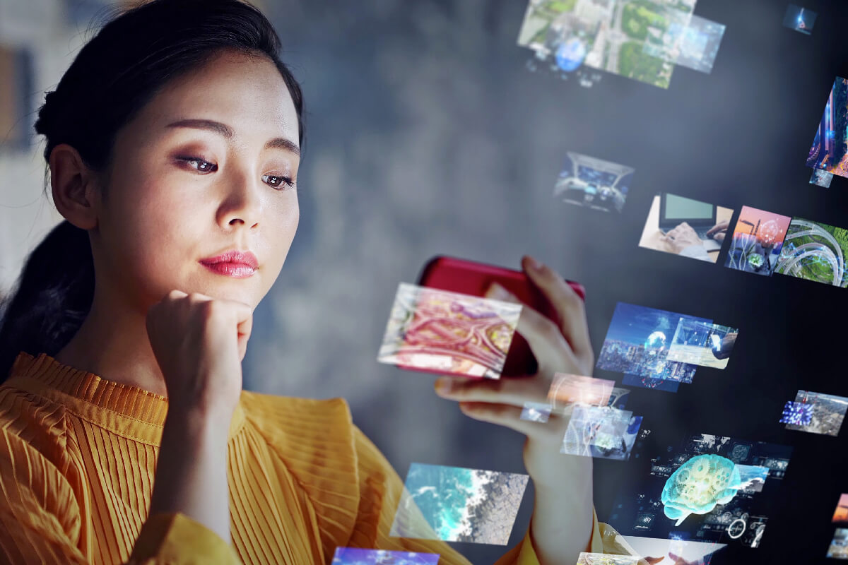 Young asian woman watching a lot of movies. Digital transformation.